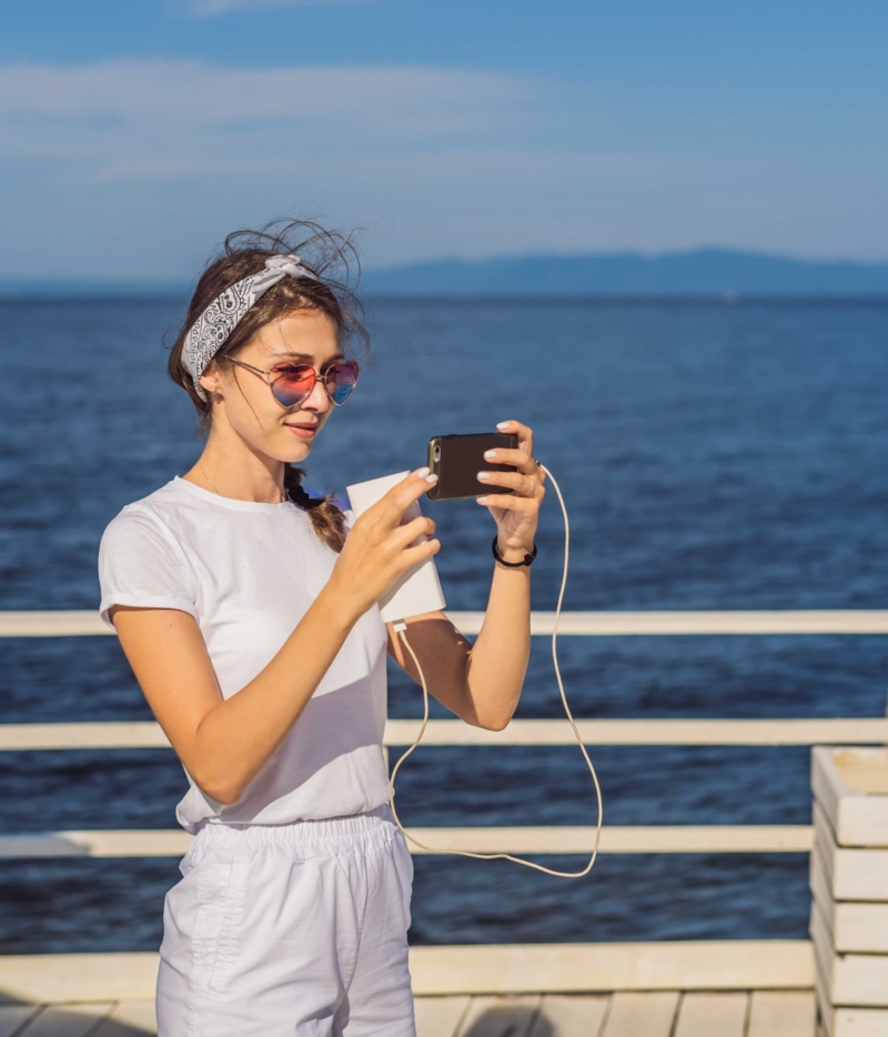 woman using XipLink™ WAN Optimiser onboard a cruise